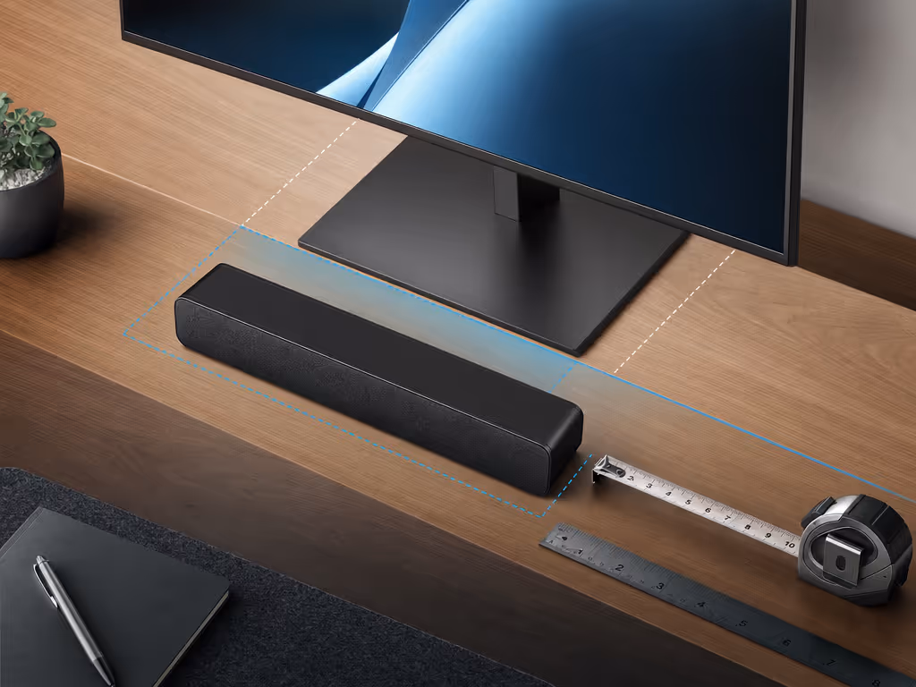 compact_desktop_soundbar_placement_beneath_monitor